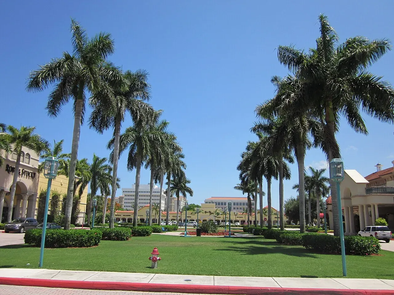 Royal palms and lawn at Mizner Park shopping district, Boca Raton
