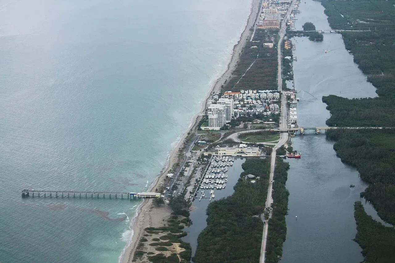 Aerial of Dania Beach pier, marina and shoreline, Dania Beach, FL