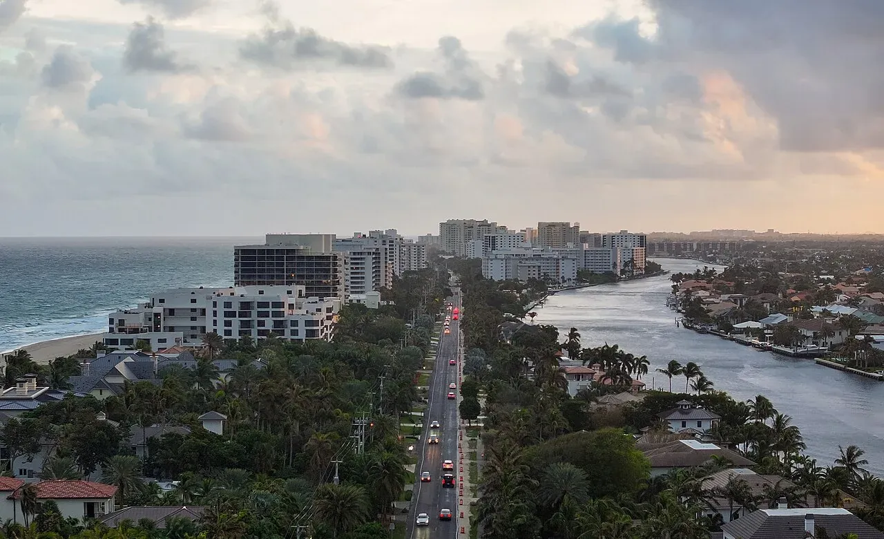 Skyline of oceanfront condos between beach and Intracoastal, Highland Beach, FL