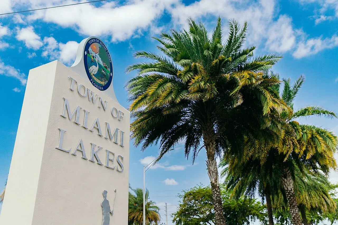Town of Miami Lakes entrance monument with palms, Miami Lakes