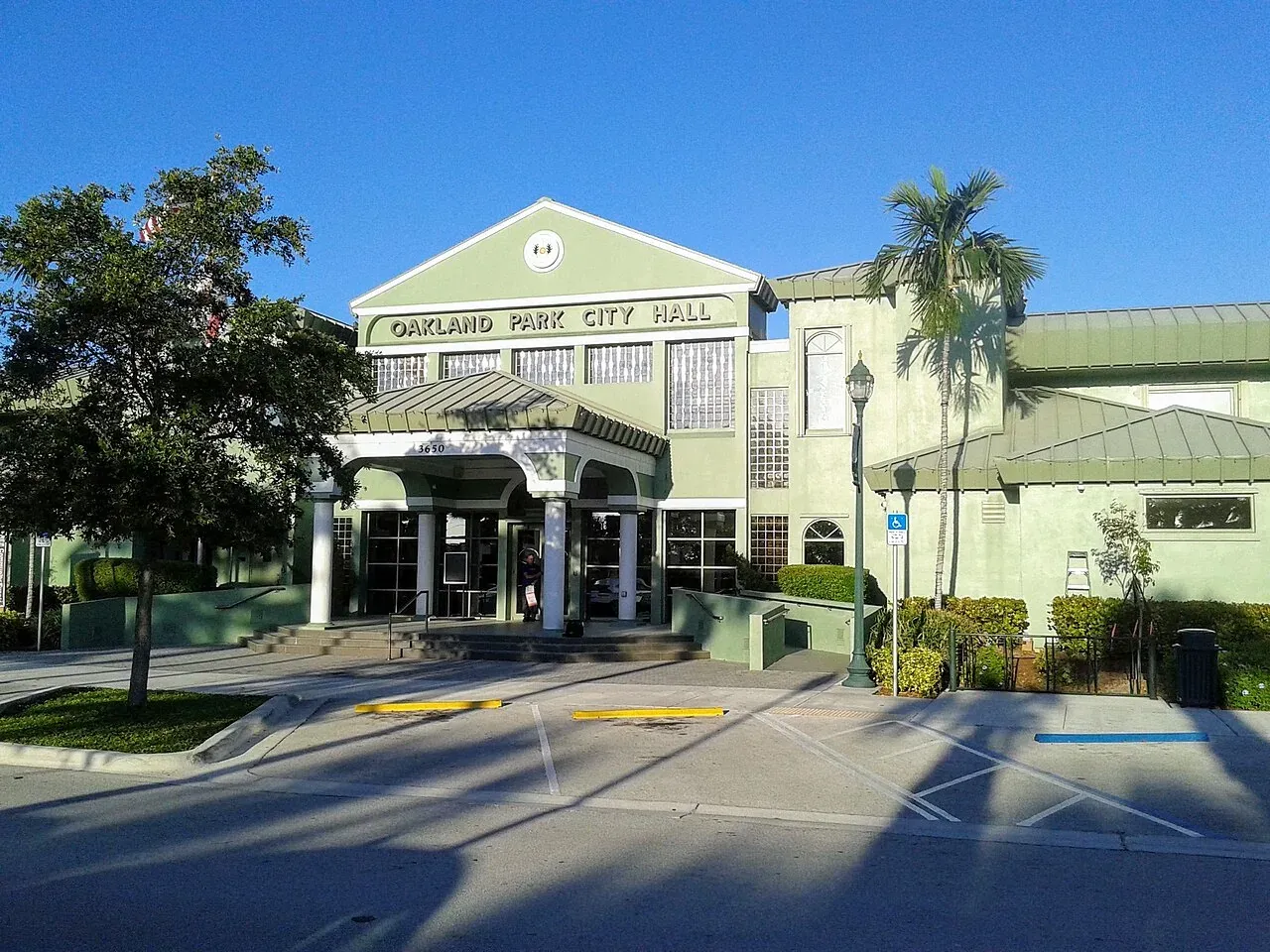 Oakland Park City Hall entrance with palm trees, Oakland Park