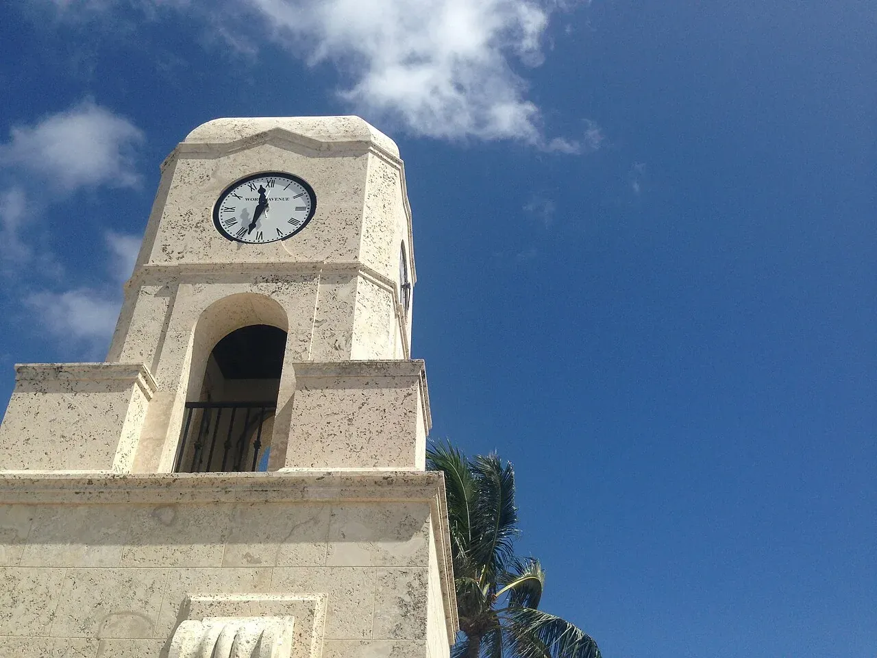 Worth Avenue clock tower landmark against blue sky, Palm Beach, FL