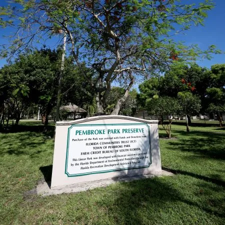Pembroke Park Preserve entrance sign and shaded grounds in Pembroke Park, Florida
