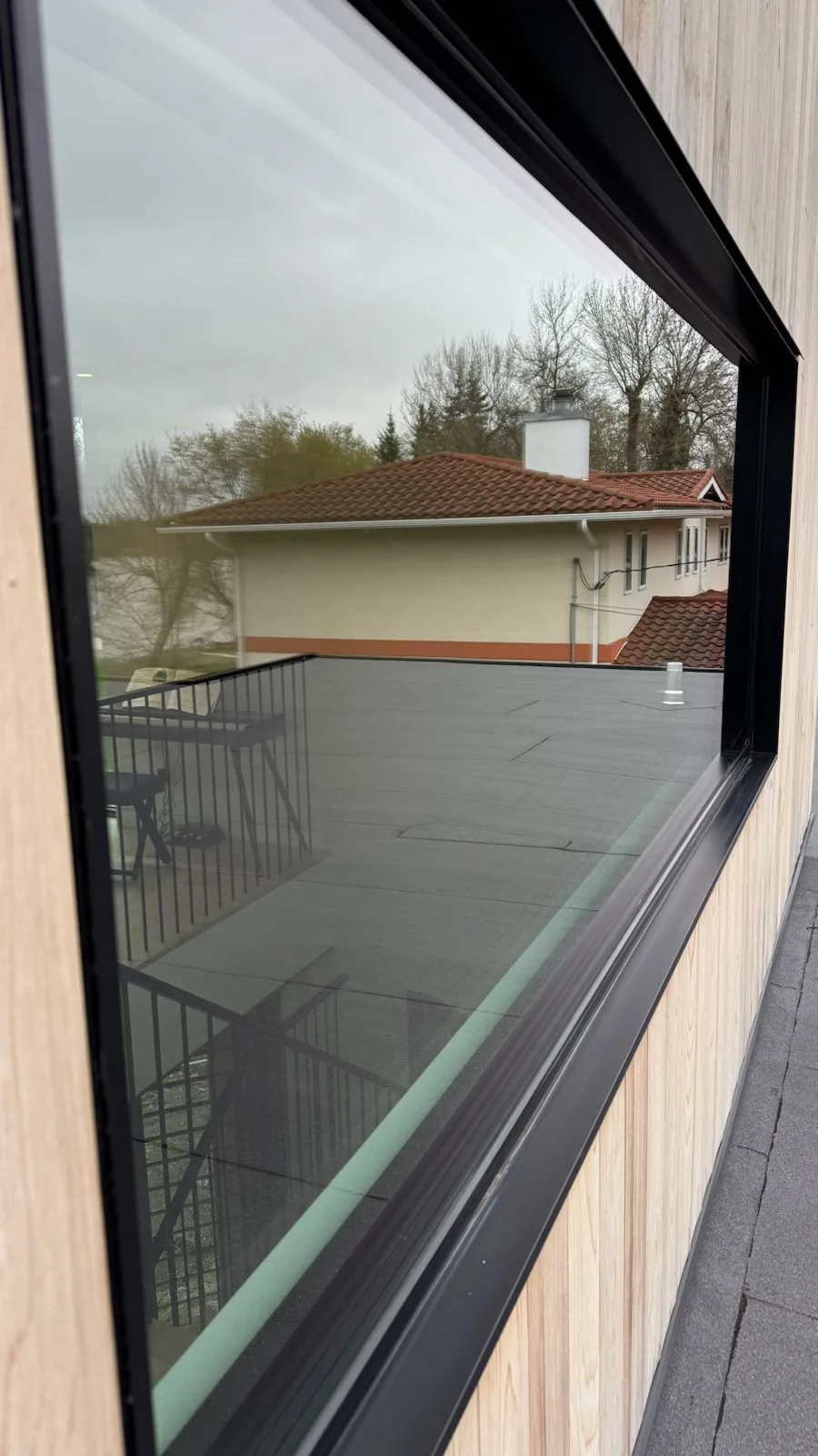 Large exterior window and track, after cleaning