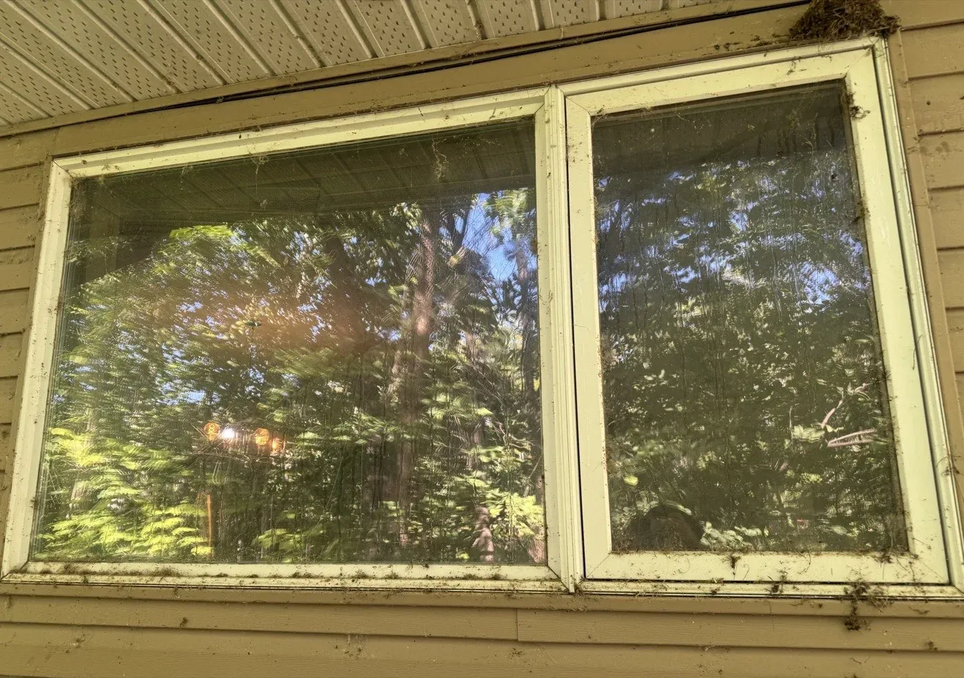 Wood-framed window, before cleaning
