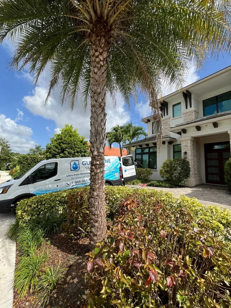 Gulfshine service van outside a South Florida home